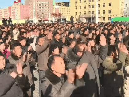 Members of the public watched on as the launch was announced in Pyongyang.