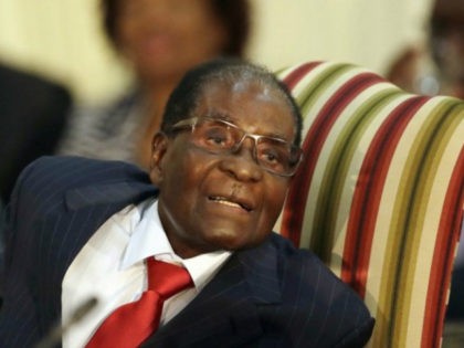 FILE - In this file photo dated Tuesday, Oct. 3, 2017, Zimbabwe's President Robert Mugabe, during his meeting with South African President Jacob Zuma, at the Presidential Guesthouse in Pretoria, South Africa. Zimbabwe President Robert Mugabe has long faced United States sanctions over his government's human rights abuses, but the …