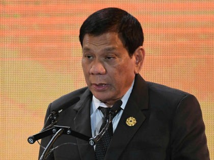 Philippine President Rodrigo Duterte speaks on the second day of the APEC CEO Summit, taking place ahead of the Asia-Pacific Economic Cooperation (APEC) leaders summit in the central Vietnamese city of Danang on November 9, 2017. World leaders and senior business figures are gathering in the Vietnamese city of Danang …