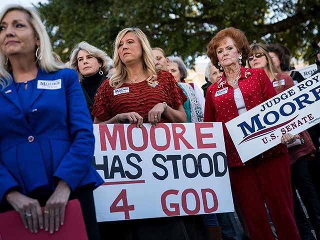 MONTGOMERY, AL - NOVEMBER 17: Women attend a 'Women For Moore' rally in support of Republican candidate for U.S. Senate Judge Roy Moore, in front of the Alabama State Capitol, November 17, 2017 in Montgomery, Alabama. Kayla Moore told the crowd of supporters that her husband will not bow out …