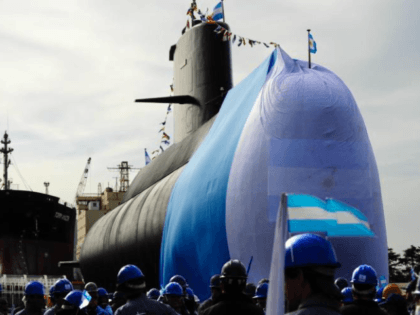In this Sept. 27, 2011 photo, workers stand around the ARA San Juan submarine during a cer
