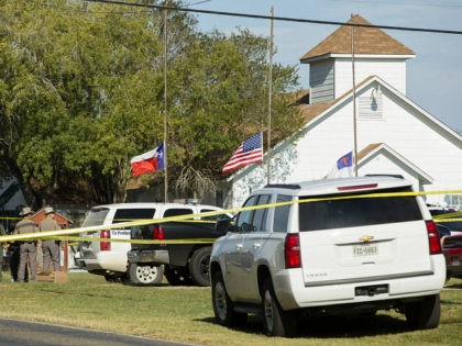 SUTHERLAND SPRINGS, TX - NOVEMBER 5: Law enforcement officials gather near the First Baptist Church following a shooting on November 5, 2017 in Sutherland Springs, Texas. At least 20 people were reportedly killed and 24 injured when a gunman, identified as Devin P. Kelley, 26, allegedly entered the church during …