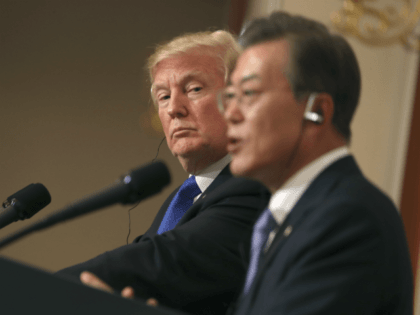 President Donald Trump, left, listens to South Korean President Moon Jae-in during a joint news conference at the Blue House in Seoul, South Korea, Tuesday, Nov. 7, 2017. President Donald Trump, on his first day on the Korean peninsula, signaled a willingness to negotiate with North Korea to end its …
