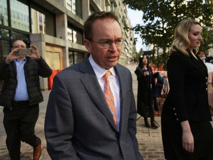WASHINGTON, DC - NOVEMBER 27: White House Budget Director Mick Mulvaney, President Donald Trump's pick for acting director of the Consumer Financial Protection Bureau, walks back to the White House from the CFPB building after he showed up for his first day of work on November 27, 2017 in Washington, …