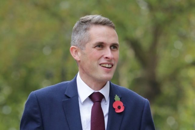 Britain's newly appointed Defence Secretary Gavin Williamson walks into the Ministry of De