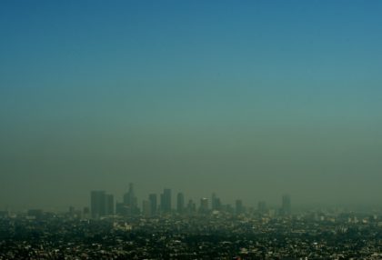The smog-shrouded Los Angeles skyline is seen in this file photo from May 31, 2015. The latest US report says this current period in time is "the warmest in the history of modern civilization"
