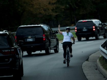 Cyclist who gave Trump the finger loses her job: report