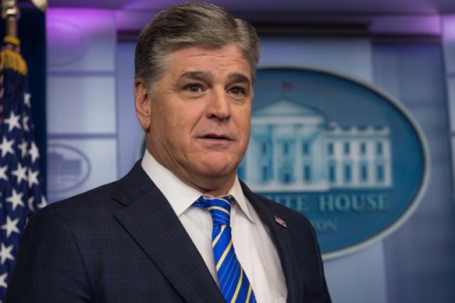Sean Hannity, pictured in the White House briefing room in January 2017, draws millions of viewers every night to his Fox News show