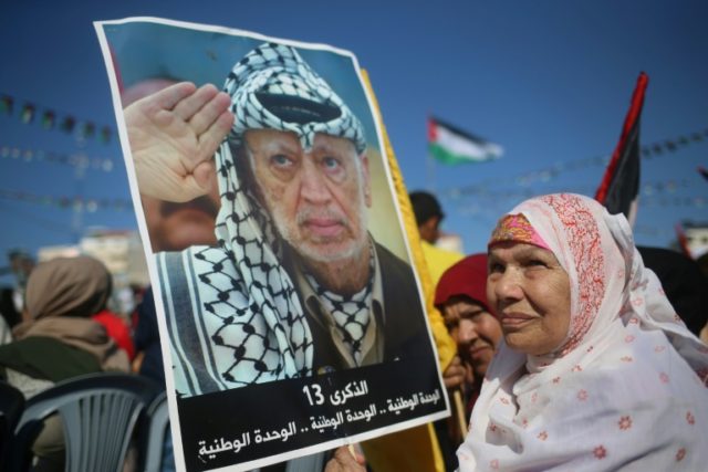Palestinians in Gaza City mark the 13th anniversary of the death of Yasser Arafat on Novem