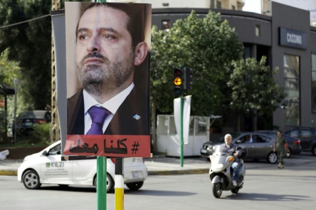 A poster of Lebanese Prime Minister Saad Hariri is seen hanging on a pole in the capital B