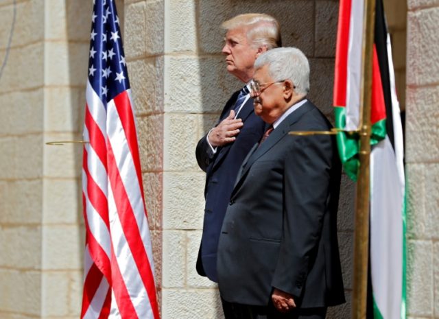 Palestinian president Mahmud Abbas (R) welcomes US counterpart Donald Trump to the West Bank town of Bethlehem on May 23, 2017