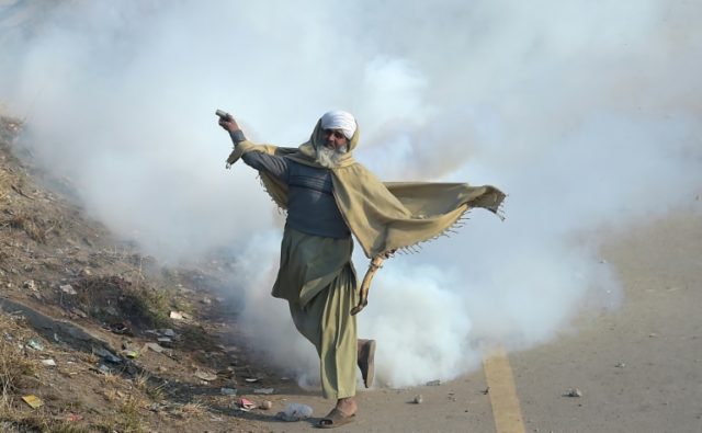 A Pakistani protester of the Tehreek-i-Labaik Yah Rasool Allah Pakistan religious group th