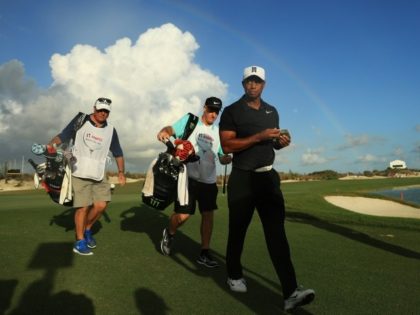 Tiger Woods of the United States walks off of the 18th green during the first round of the Hero World Challenge at Albany, Bahamas on November 30, 2017 in Nassau, Bahamas