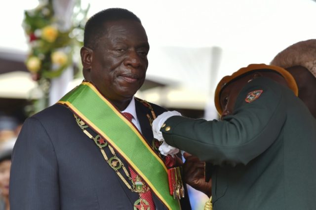 Zimbabwe's new interim President Emmerson Mnangagwa says huge sums of money and other