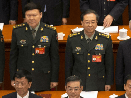 In this March 5, 2017, photo, Zhang Yang, left, the then-head of China's People's Liberation Army (PLA) political affairs department, and Fang Fenghui, right, the then-chief of the general staff of the Chinese People's Liberation Army stand during the opening session of China's National People's Congress (NPC) at the Great …