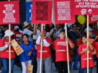 $15-minimum-wage-protest-ap $15 minimum wage hike sign