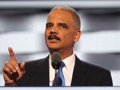 PHILADELPHIA, PA - JULY 26: Former U.S. Attorney General Eric Holder delivers remarks on the second day of the 2016 Democratic National Convention at Wells Fargo Center on July 26, 2016 in Philadelphia, Pennsylvania. An estimated 50,000 people are expected in Philadelphia, including hundreds of protesters and members of the …
