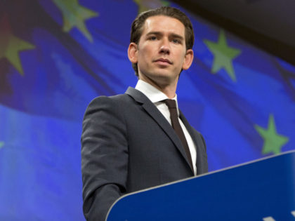 Austrian Chancellor Sebastian Kurz listens to questions during a joint media conference wi