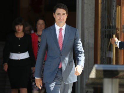 Canadian Prime Minister Justin Trudeau arrives to speak to the press outside Rideau Hall after announcing changes to his cabinet in Ottawa, Ontario on August 28, 2017. / AFP PHOTO / Lars Hagberg (Photo credit should read LARS HAGBERG/AFP/Getty Images)