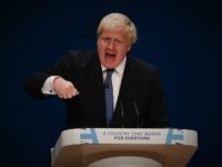 BRITAIN-POLITICS-CONSERVATIVE British Foreign Secretary Boris Johnson delivers a speech on the first day of the Conservative party annual conference at the International Convention Centre in Birmingham, central England, on October 2, 2016. Britain's governing Conservative Party meets for its annual conference from Sunday facing questions over how and when it will …