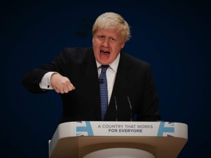 British Foreign Secretary Boris Johnson delivers a speech on the first day of the Conservative party annual conference at the International Convention Centre in Birmingham, central England, on October 2, 2016. Britain's governing Conservative Party meets for its annual conference from Sunday facing questions over how and when it will …
