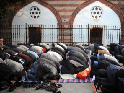 Muslim worshippers pray in front of a mosque in downtown Sofia on September 30, 2008, as they mark Eid al-Fitr at the end of the holy month of Ramadan. AFP PHOTO / DIMITAR DILKOFF (Photo credit should read DIMITAR DILKOFF/AFP/Getty Images)