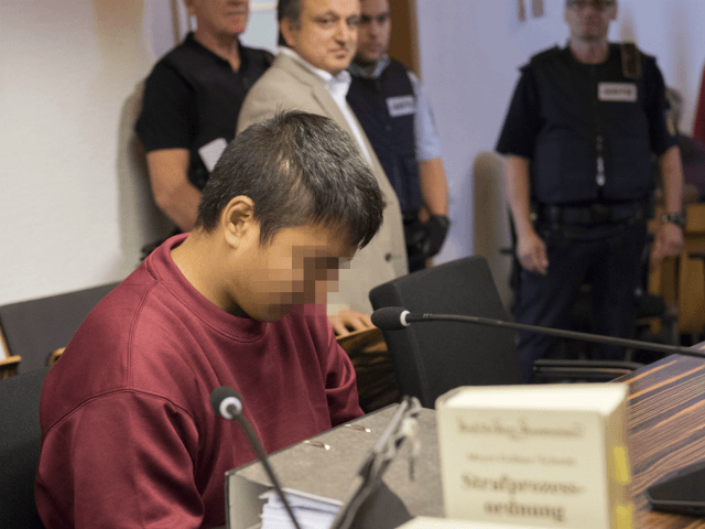 Husseen K, who is accused of raping and killing a young woman in October 2016, waits at the court room at the regional court in Freiburg, southern Germany, on September 5, 2017. The teenage Afghan refugee goes on trial for rape and murder, having previously been convicted of attempted murder …