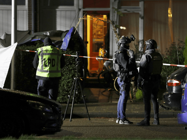 Police officers investigate the crime site in the Botsaartstraat in Maastricht, the Nether