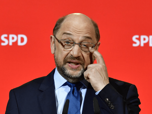 The leader of the Social Democratic Party (SPD), Martin Schulz gestures during a press conference on December 15, 2017 in Berlin. Leaders of the Social Democrats (SPD) meet on December 15, 2017 to approve the start of preliminary talks with German Chancellor's conservatives on ending the country's political deadlock. / …