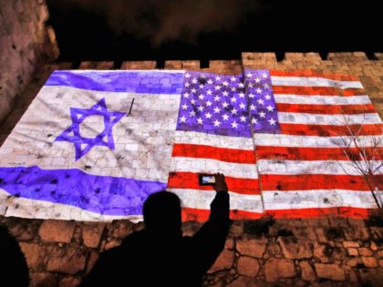 Israeli and American flag on Jerusalem wall (Ahmad Gharabli / AFP / Getty)
