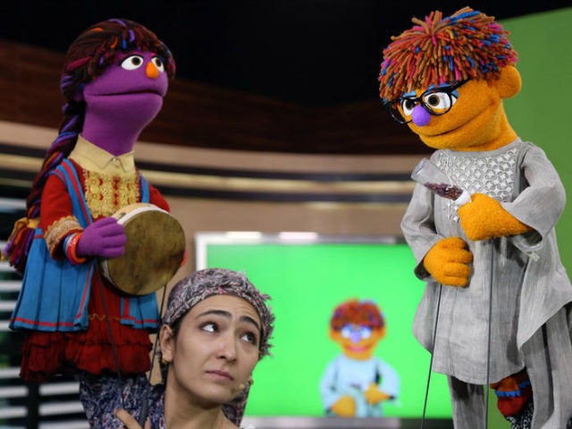 The MacArthur Foundation has awarded $100 million to Sesame Workshop and the International Rescue Committtee to create a version of Sesame Street aimed at Syrian refugee children. Above: Characters from the Afghani version of the show that premiered this year. Rahmat Gul/AP