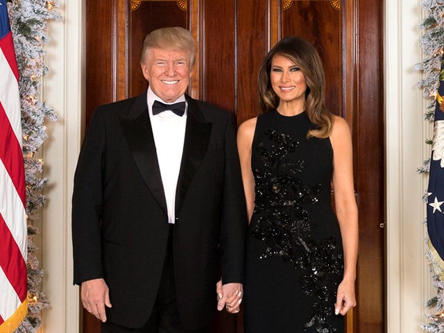 President Donald J Trump and First Lady Melania Trump pose for an Office Christmas Photo i