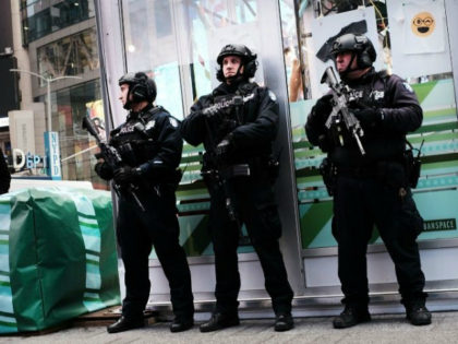 New York City police stand on a corner in Times Square, Dec. 12, 2017, in New York City.