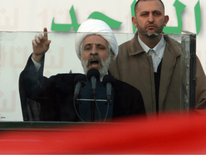Beirut, LEBANON: Hezbollah second in command Naim Qassem addresses supporters outside the Serail, the seat of government, surrounded by anti-government protesters in Beirut 10 December 2006. Lebanese Prime Minister Fuad Siniora vowed his government would overcome the challenge posed by thousands of opposition protesters led by the Shiite militant group …