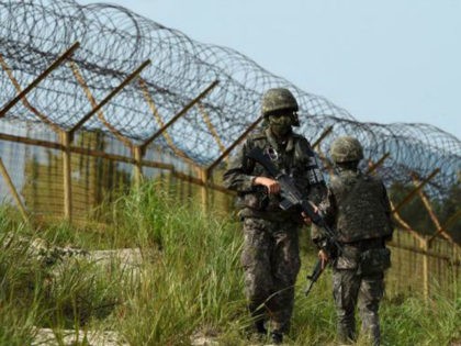 South Korea's military has fired warning shots at North Korean guards searching for a soldier who defected. The DMZ is one of the world's most heavily guarded strips of land.