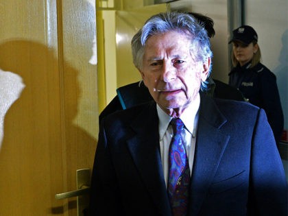 French-Polish film director Roman Polanski arrives for a hearing at the regional court in Krakow on February 25, 2015. The court is to decide whether to extradite the Oscar-winning director to the United States for sentencing on charges that he raped a 13-year-old girl in 1977. AFP PHOTO / JANEK …
