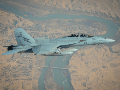 An RAAF F/A-18F Super Hornet manoeuvres over Rawah, Iraq, during an Operation OKRA sortie.