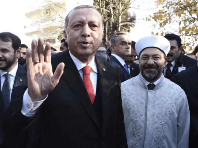 Turkish President Recep Tayyip Erdogan waves to the crowd as he goes to Minority School in the northeastern Greek town of Komotini, Friday, Dec. 8, 2017. Erdogan met Friday with members of Greece’s Muslim minority on the second day of a visit to the country that saw tensions in bilateral …