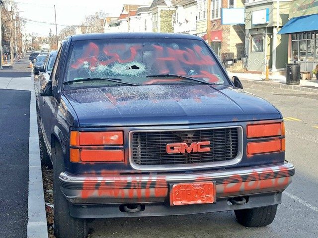 A vandal trashed a vehicle bearing pro-Trump messages in Somerville, Massachusetts.