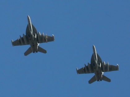 U.S. Air Force EA-18G Growler fighter jets fly over the Osan U.S. Air Base in Pyeongtaek,