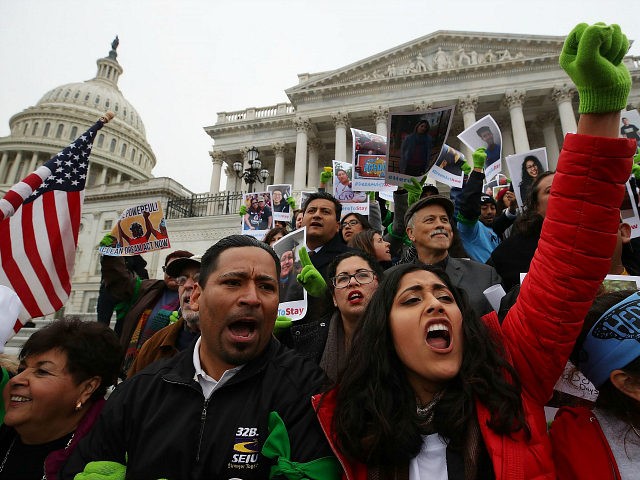 WASHINGTON, DC - DECEMBER 06: People who call themselves Dreamers, protest in front of the Senate side of the US Capitol to urge Congress in passing the Deferred Action for Childhood Arrivals (DACA) program, on December 6, 2017 in Washington, DC. (Photo by Mark Wilson/Getty Images)