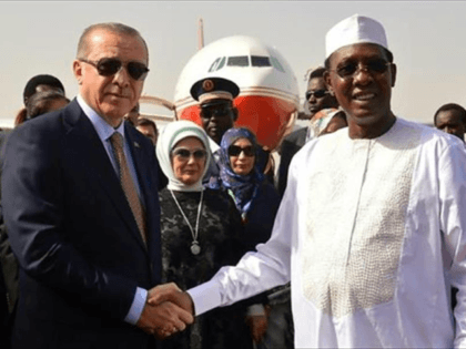 Turkish President Recep Tayyip Erdogan (L) shakes hands with Chad's President Idriss Deby (R) upon arrival in N'Djamena on December 26, 2017.