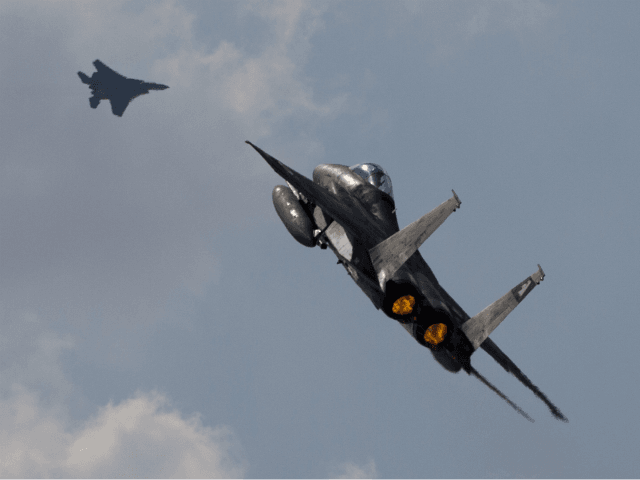 In this Wednesday, Nov. 8, 2017 photo Two Israeli air force F-15s of the Knights of the tw