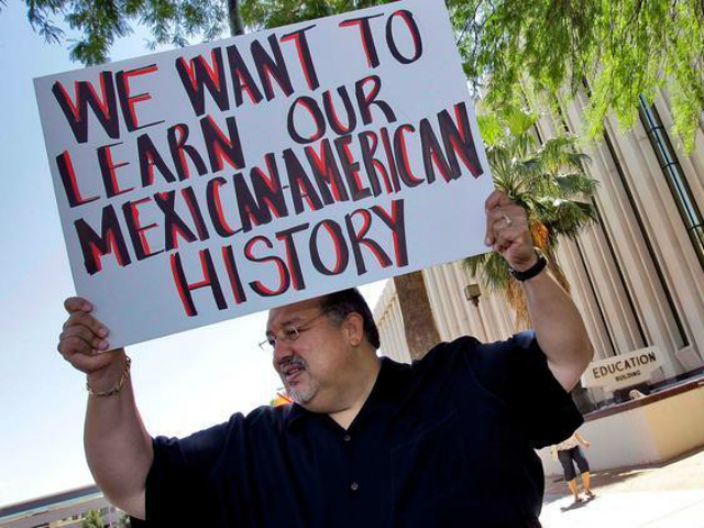 Carlos Galindo protests outside the Arizona Department of Education in Phoenix in 2011. St