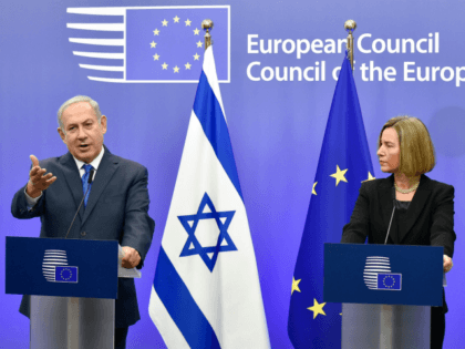 BELGIUM-EU-ISRAEL-DIPLOMACY Israel's Prime Minister Benjamin Netanyahu speaks as EU foreign policy chief, Federica Mogherini looks on during a press conference at the European Council in Brussels on December 11, 2017. Israeli Prime Minister Benjamin Netanyahu is ?holding talks on December 11 with EU foreign ministers, days after the US decision …