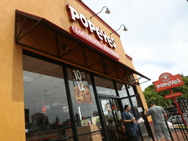 A Popeyes restaurant is seen on February 21, 2017 in Miami, Florida. Burger King and Tim H