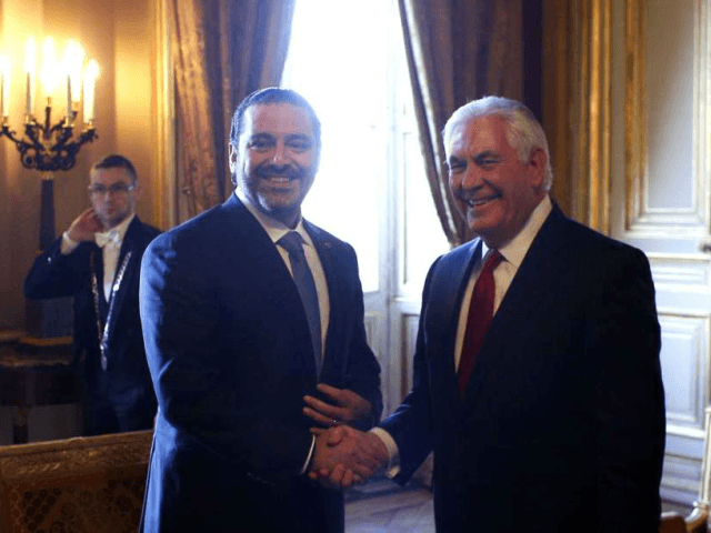 Lebanon's Prime Minister Saad Hariri, left, shakes hands with U.S. Secretary of State Rex