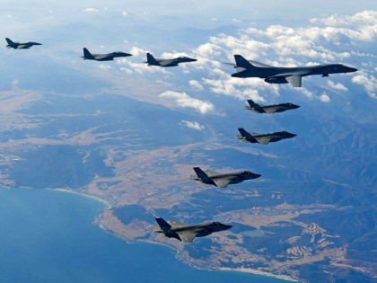 KOREAN PENINSULA, SOUTH KOREA - DECEMBER 06: In this handout image provided by South Korean Defense Ministry, U.S. Air Force B-1B bomber (L), South Korea and U.S. fighter jets fly over the Korean Peninsula during the Vigilant air combat exercise (ACE) on December 6, 2017 in Korean Peninsula, South Korea. …