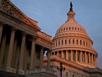 The U.S. Capitol stands at sunrise in Washington, D.C., U.S., on Thursday, Nov. 30, 2017.