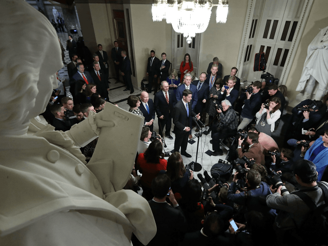 : Speaker of the House Paul Ryan (R-WI) (C) is joined by House Republican leaders while talking to reporters following passage of the Tax Cuts and Jobs Act in the Will Rogers Corridor at the U.S. Capitol December 19, 2017 in Washington, DC. The House passed the tax cut legislation …